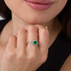 Pear-Shaped Lab-Created Emerald and 0.145 CT. T.W. Diamond Knot Frame Ring in Sterling Silver