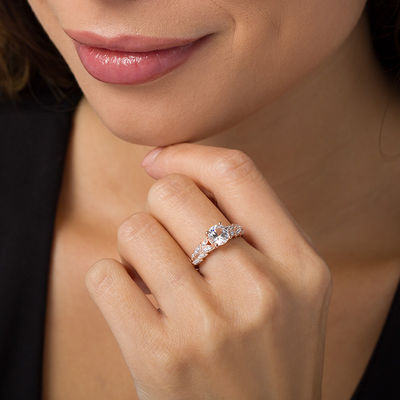 7.0mm Lab-Created White Sapphire and 0.086 CT. T.W. Diamond Leaves Ring in Sterling Silver with 14K Rose Gold Plate