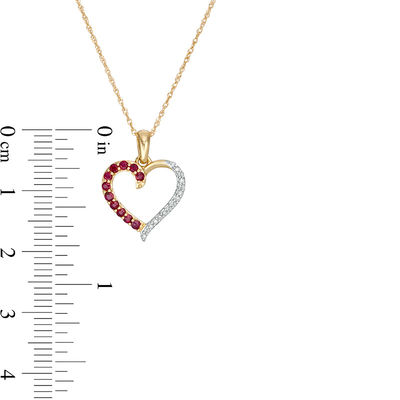 Ruby and 0.04 CT. T.W. Diamond Half-and-Half Heart Pendant in 10K Gold