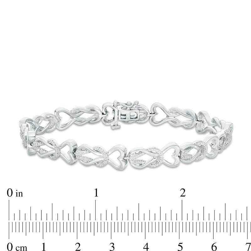 0.46 CT. T.W. Diamond Heart Double Knot Bracelet in Sterling Silver