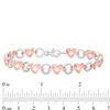 Thumbnail Image 2 of 0.18 CT. T.W. Diamond Love Knot Heart and Open Circle Alternating Bracelet in Sterling Silver and 10K Rose Gold - 7.25"
