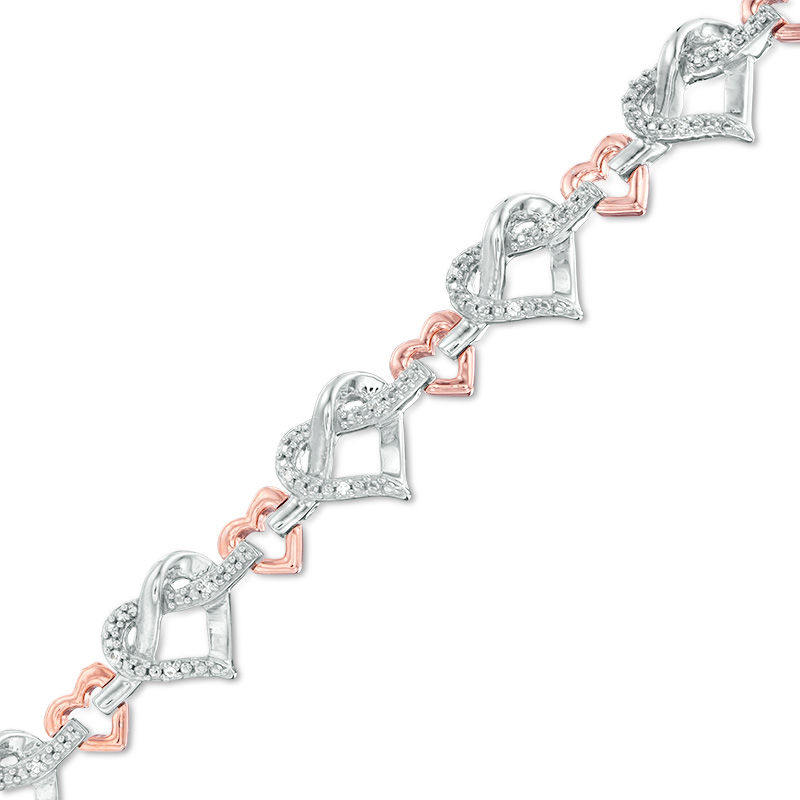 0.085 CT. T.W. Diamond Love Knot Heart Bracelet in Sterling Silver and 10K Rose Gold|Peoples Jewellers