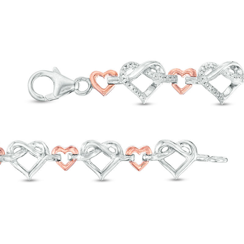 0.085 CT. T.W. Diamond Love Knot Heart Bracelet in Sterling Silver and 10K Rose Gold