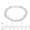 Thumbnail Image 2 of 0.085 CT. T.W. Diamond Love Knot Heart Bracelet in Sterling Silver and 10K Rose Gold