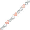 Thumbnail Image 0 of 0.115 CT. T.W. Diamond Infinity Heart Bracelet in Sterling Silver and 10K Rose Gold