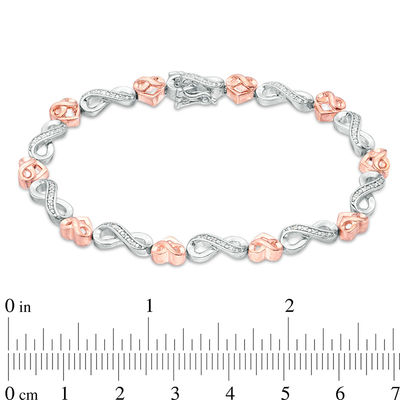 0.115 CT. T.W. Diamond Infinity Heart Bracelet in Sterling Silver and 10K Rose Gold