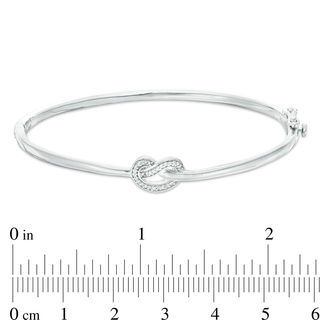 0.065 CT. T.W. Diamond Love Knot Pretzel Bangle in Sterling Silver