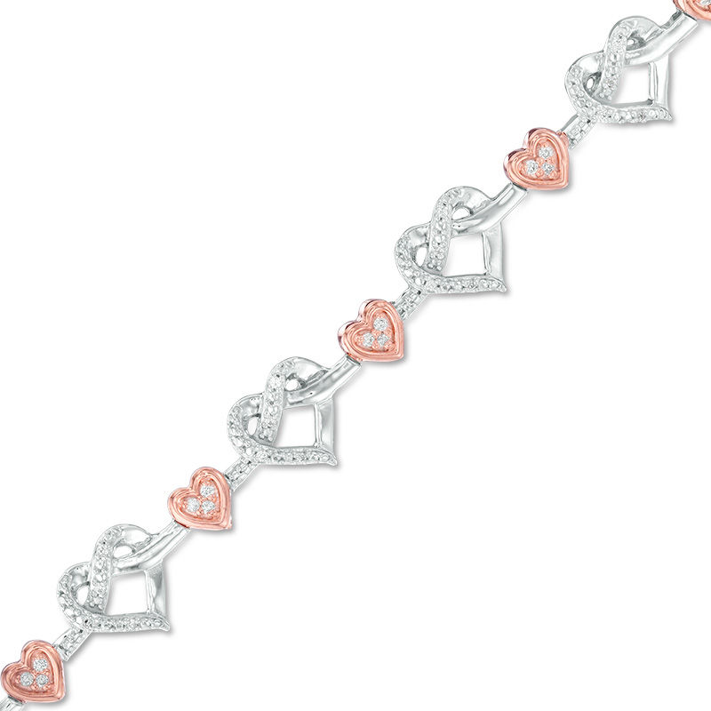 0.23 CT. T.W. Diamond Infinity Love Knot Bracelet in Sterling Silver and 10K Rose Gold|Peoples Jewellers