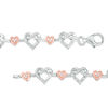 Thumbnail Image 1 of 0.23 CT. T.W. Diamond Infinity Love Knot Bracelet in Sterling Silver and 10K Rose Gold