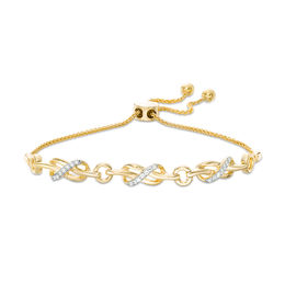 0.145 CT. T.W. Diamond Triple Infinity Knot Bolo Bracelet in Sterling Silver with 14K Gold Plate - 9.5&quot;