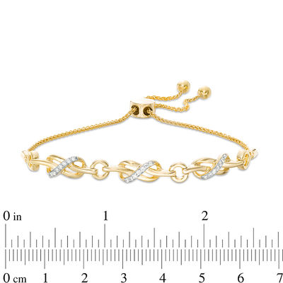 0.145 CT. T.W. Diamond Triple Infinity Knot Bolo Bracelet in Sterling Silver with 14K Gold Plate - 9.5"