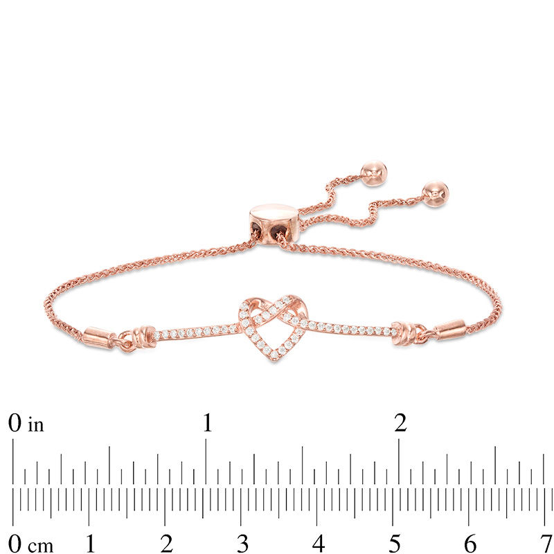 0.18 CT. T.W. Diamond Love Knot Heart Bolo Bracelet in Sterling Silver with 14K Rose Gold Plate - 9.5"|Peoples Jewellers