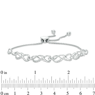 0.065 CT. T.W. Diamond Infinity Knot Bolo Bracelet in Sterling Silver - 9.5"