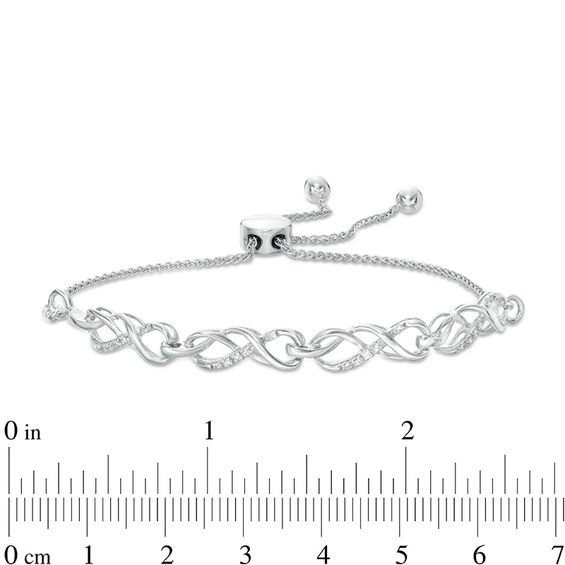 0.065 CT. T.W. Diamond Infinity Knot Bolo Bracelet in Sterling Silver - 9.5"