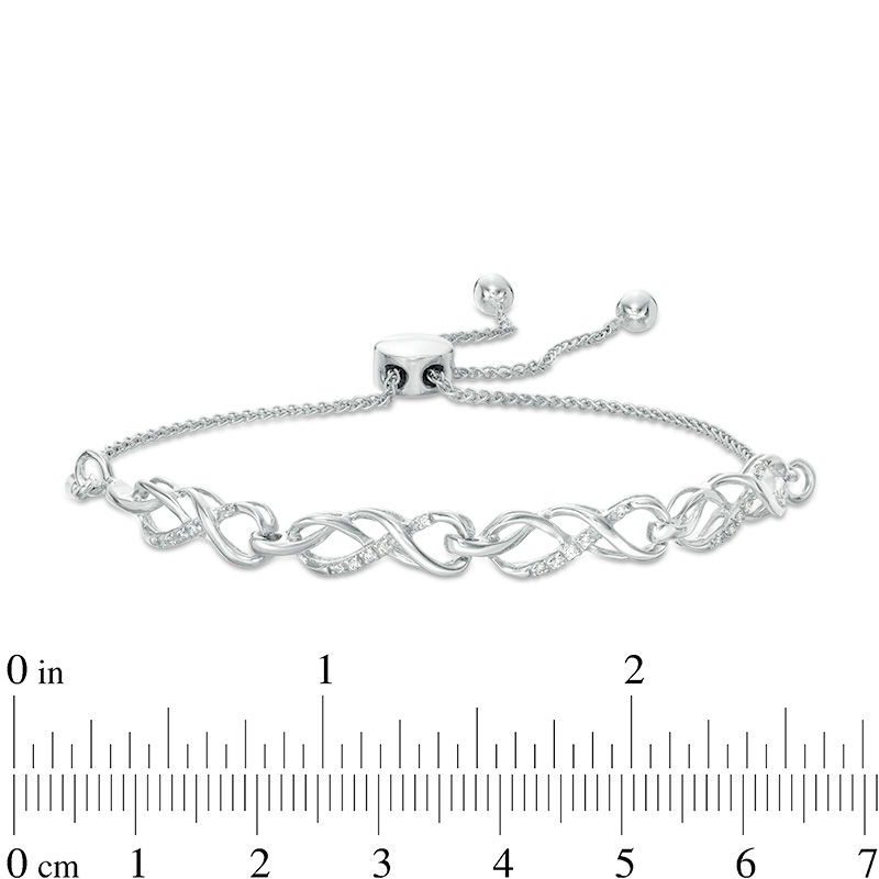 0.065 CT. T.W. Diamond Infinity Knot Bolo Bracelet in Sterling Silver - 9.5"|Peoples Jewellers
