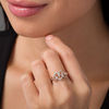 Thumbnail Image 1 of 0.065 CT. T.W. Diamond Interlocking Infinity Hearts Ring in Sterling Silver and 10K Rose Gold