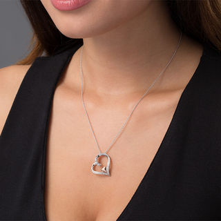 0.10 CT. T.W. Diamond Tilted Heart Within Heart Pendant in Sterling Silver and 10K Rose Gold