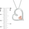 0.10 CT. T.W. Diamond Tilted Heart Within Heart Pendant in Sterling Silver and 10K Rose Gold