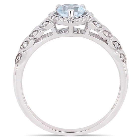 5.0mm Heart-Shaped Sky Blue Topaz and 0.05 CT. T.W. Diamond Beaded Frame Leaf Shank Ring in 10K White Gold