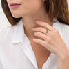 Oval Emerald and 0.085 CT. T.W. Diamond Frame Vintage-Style Ring in 10K Gold