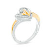 Thumbnail Image 1 of 0.04 CT. T.W. Diamond Heartbeat in Heart Crossover Ring in Sterling Silver and 10K Gold