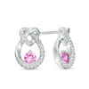 Thumbnail Image 0 of 3.0mm Lab-Created Pink Sapphire and 0.147 CT. T.W. Diamond Heart Knot Teardrop Earrings in 10K White Gold