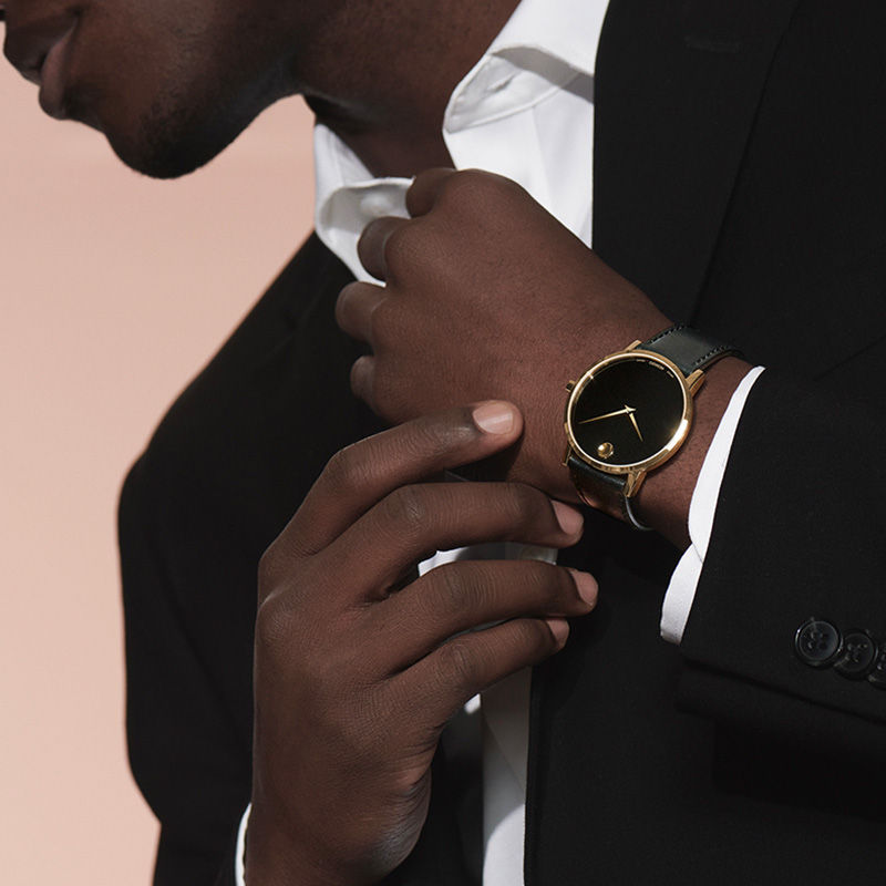 Movado black and discount gold