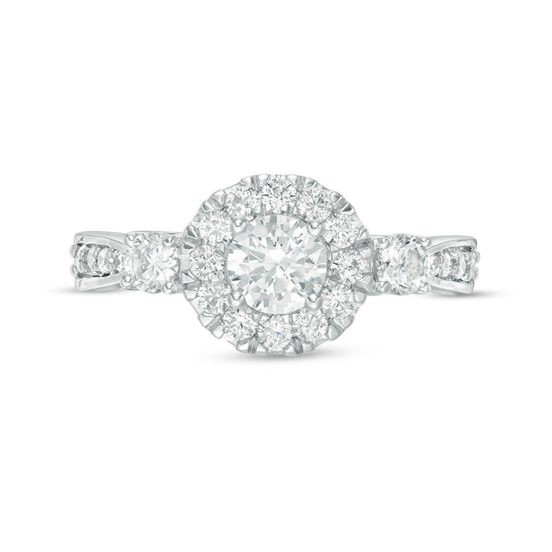 0.95 CT. T.W. Diamond Frame Three Stone Engagement Ring in 10K White Gold