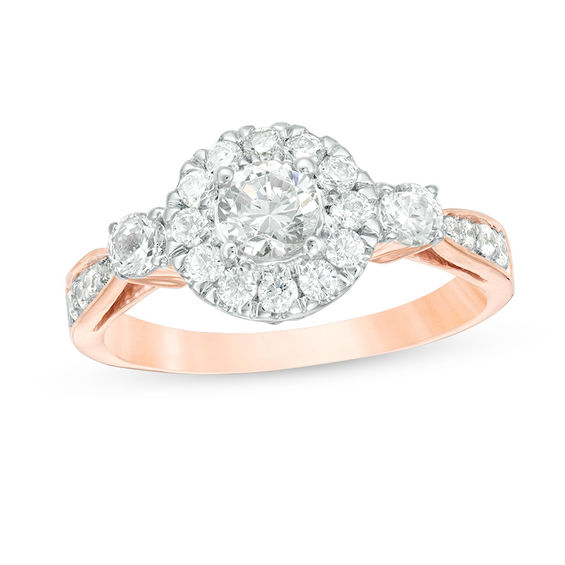 0.95 CT. T.W. Diamond Frame Three Stone Engagement Ring in 10K Rose Gold