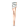 0.45 CT. T.W. Diamond Three Stone Twist Frame Engagement Ring in 10K Rose Gold