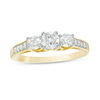 Thumbnail Image 0 of 0.69 CT. T.W. Diamond Three Stone Engagement Ring in 10K Gold