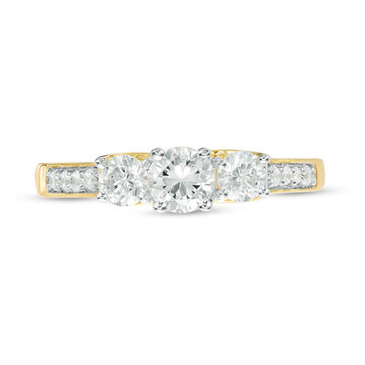 0.69 CT. T.W. Diamond Three Stone Engagement Ring in 10K Gold