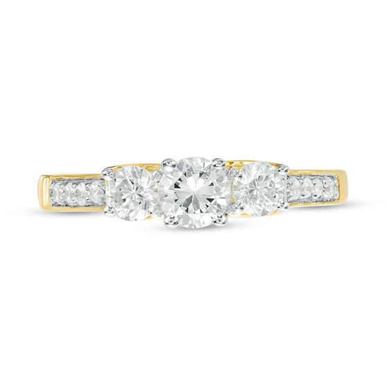 0.69 CT. T.W. Diamond Three Stone Engagement Ring in 10K Gold