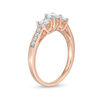 0.69 CT. T.W. Diamond Three Stone Engagement Ring in 10K Rose Gold