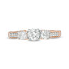 0.69 CT. T.W. Diamond Three Stone Engagement Ring in 10K Rose Gold