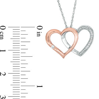 0.04 CT. T. W. Diamond Interlocking Hearts Pendant in Sterling Silver and 10K Rose Gold