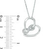 0.04 CT. T.W. Diamond Infinity Wrapped Tilted Heart Pendant in Sterling Silver