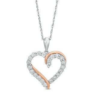 0.085 CT. T.W. Diamond Overlay Heart Pendant in Sterling Silver and 10K Rose Gold