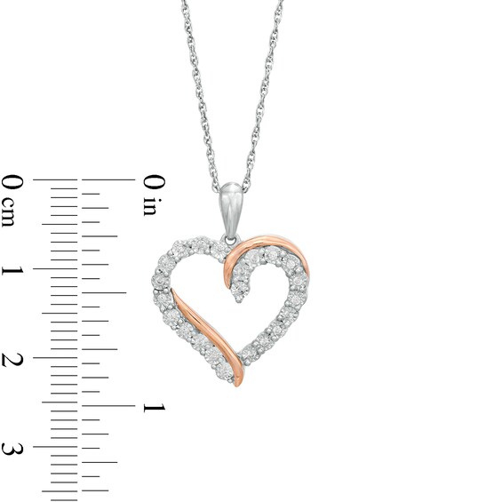 0.085 CT. T.W. Diamond Overlay Heart Pendant in Sterling Silver and 10K Rose Gold