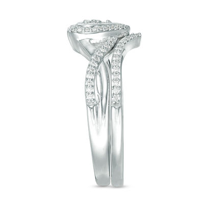 0.22 CT. T.W. Diamond Heart Frame Twist Bridal Set in 10K White Gold