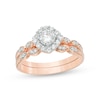 0.58 CT. T.W. Diamond Tilted Cushion Frame Bridal Set in 10K Rose Gold