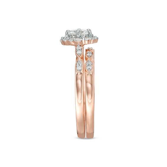 0.58 CT. T.W. Diamond Tilted Cushion Frame Bridal Set in 10K Rose Gold