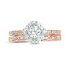 0.58 CT. T.W. Diamond Tilted Cushion Frame Bridal Set in 10K Rose Gold