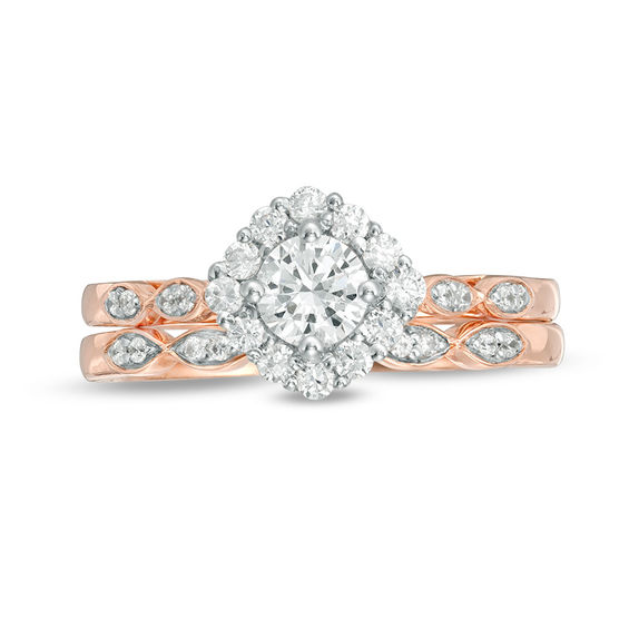 0.58 CT. T.W. Diamond Tilted Cushion Frame Bridal Set in 10K Rose Gold