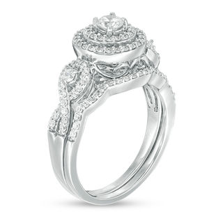 0.69 CT. T.W. Diamond Double Frame Twist Bridal Set in 10K White Gold