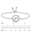 0.065 CT. T.W. Diamond Open Circle Paw Print Bolo Bracelet in Sterling Silver and 10K Rose Gold - 9.5"