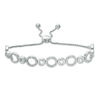 Thumbnail Image 0 of 0.146 CT. T. W. Diamond Alternating Circles Bolo Bracelet in Sterling Silver - 9.5"