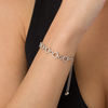 Thumbnail Image 1 of 0.146 CT. T. W. Diamond Alternating Circles Bolo Bracelet in Sterling Silver - 9.5"