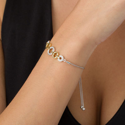 0.067 CT. T.W. Diamond Alternating Circles Bolo Bracelet in Sterling Silver and 10K Gold - 9.5"