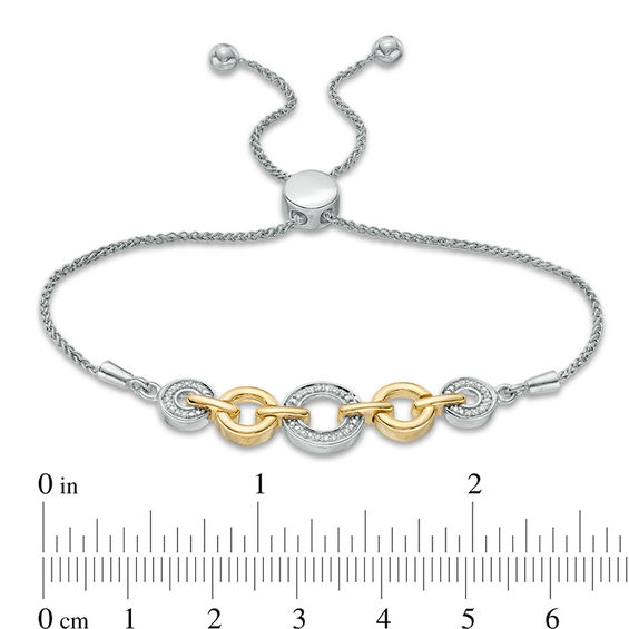 0.067 CT. T.W. Diamond Alternating Circles Bolo Bracelet in Sterling Silver and 10K Gold - 9.5"